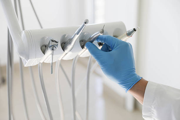 Professional Root Canal Treatment technician working in Manchester, MO